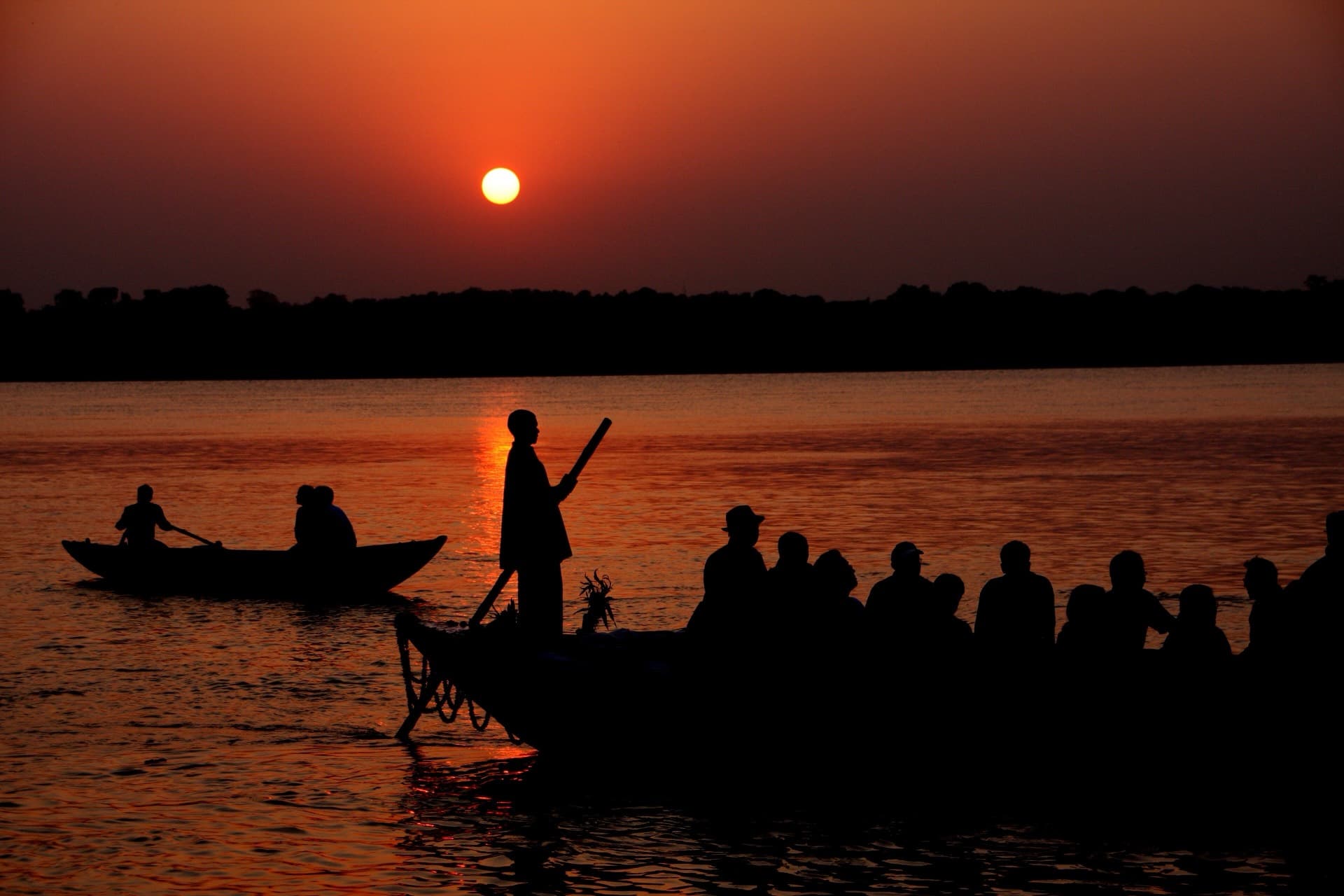 A boat on the Ganges at sunrise in Varanasi